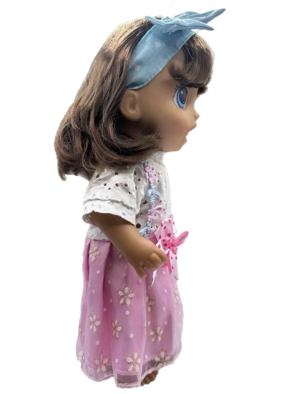 Dress-Up Baby Doll with Pink Floral Skirt and Blue Accessories